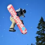 Salto con Snowboard di Giorno